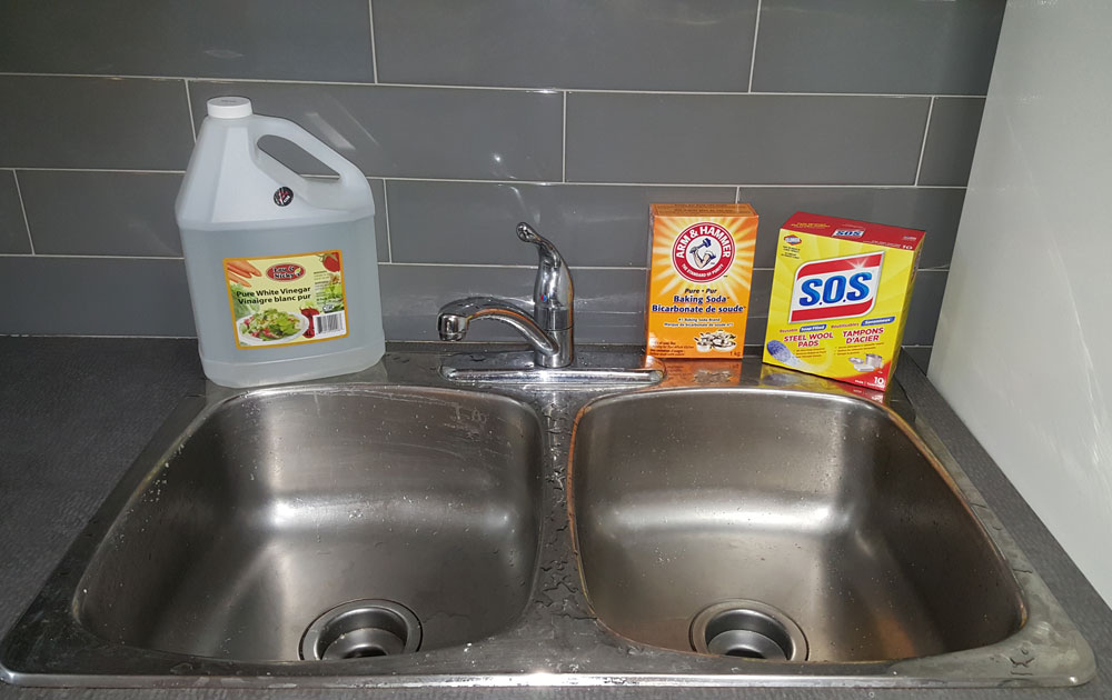 Cleaning A Stainless Steel Sink With Baking Soda And Vinegar In 2020 Deep Cleaning Cleaning Hacks House Cleaning Tips